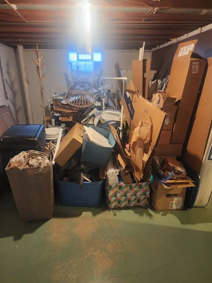 Roll-off dumpster container at job site for 2 Yard Dumpster Rental in Sheldon